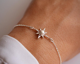 Bracelet with "HOPE" engraved on it.