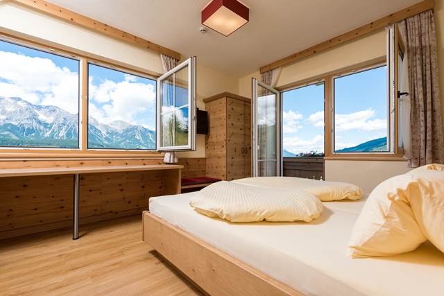Bergblick vom Bett - Bio-Pension Aussacher