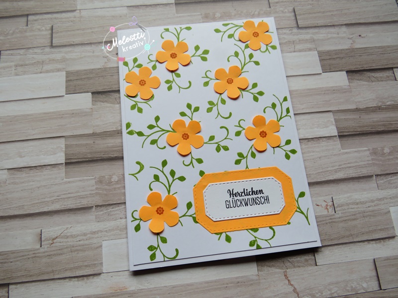 Neon-orange Blüten