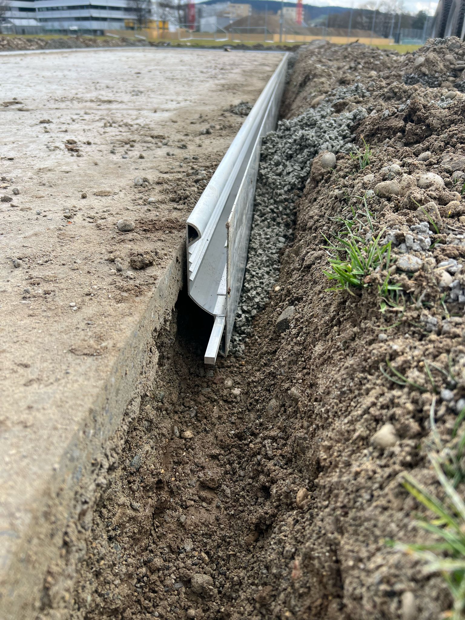 A steel band was installed around the concrete slab for protection.