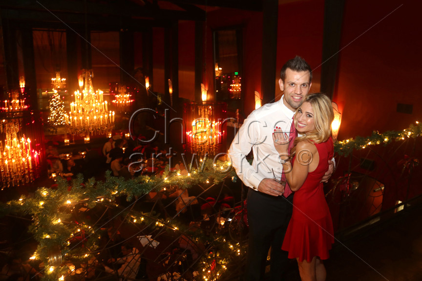 Couple portrait at holiday party.