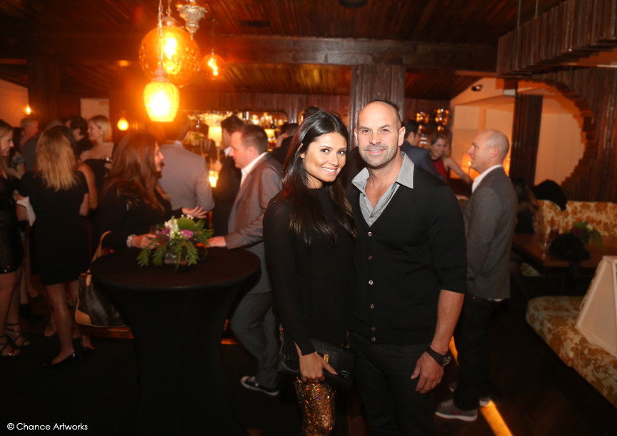 Couple portrait at holiday party.