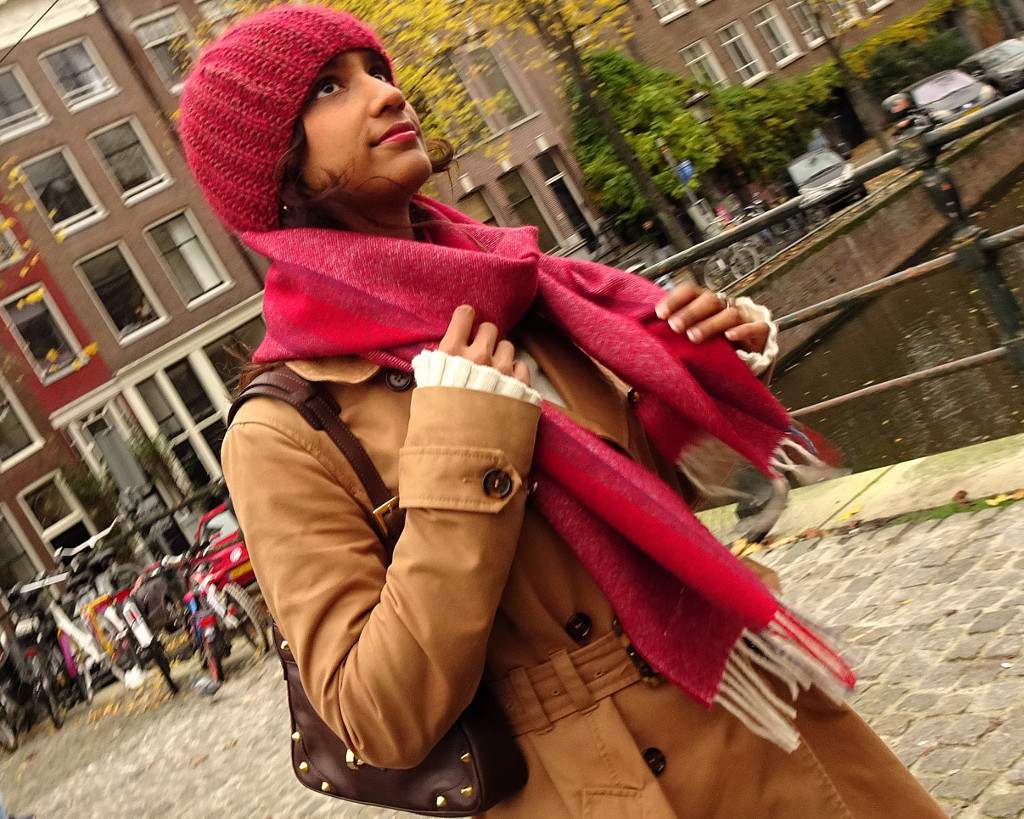 Merino wool scarf 180 × 33 cm styled on female outfit.