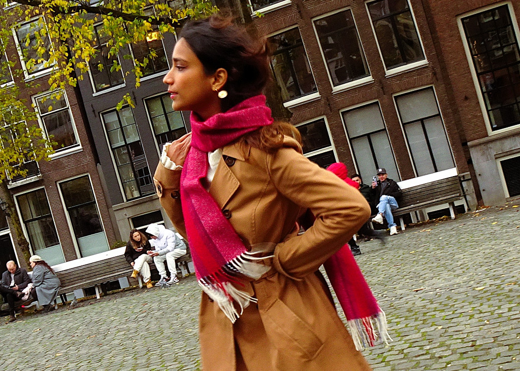 Merino wool scarf 180 × 33 cm styled on female outfit.