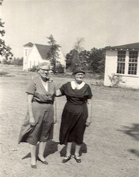 Dale, Foy, Vila Chloe JAGGERS, October 1956. Hopewell Church in seen in the background, plus a partial view of Hopewell Schoolhouse.