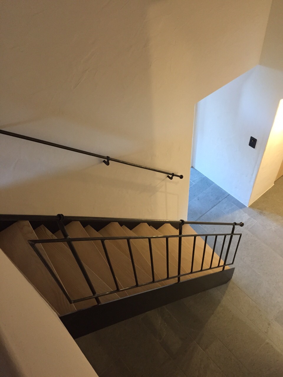 Treppe mit geschmiedetem Geländer