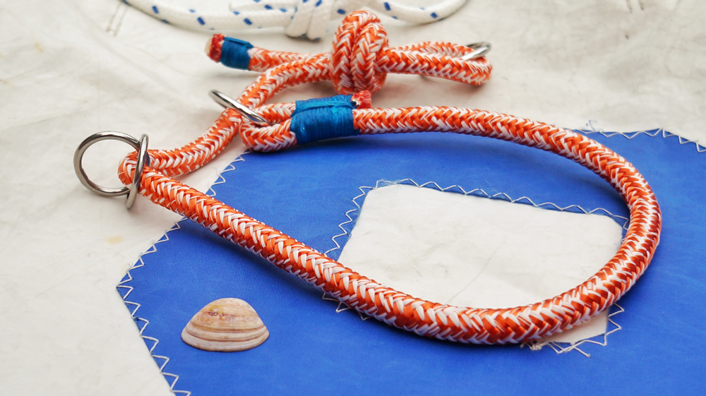 Freestyle Halsung mit  Zugbegrenzung (Tauwerk Magic Line, 9 mm, orange-weiß); Taklinge (hier blau) in diversen Farben möglich