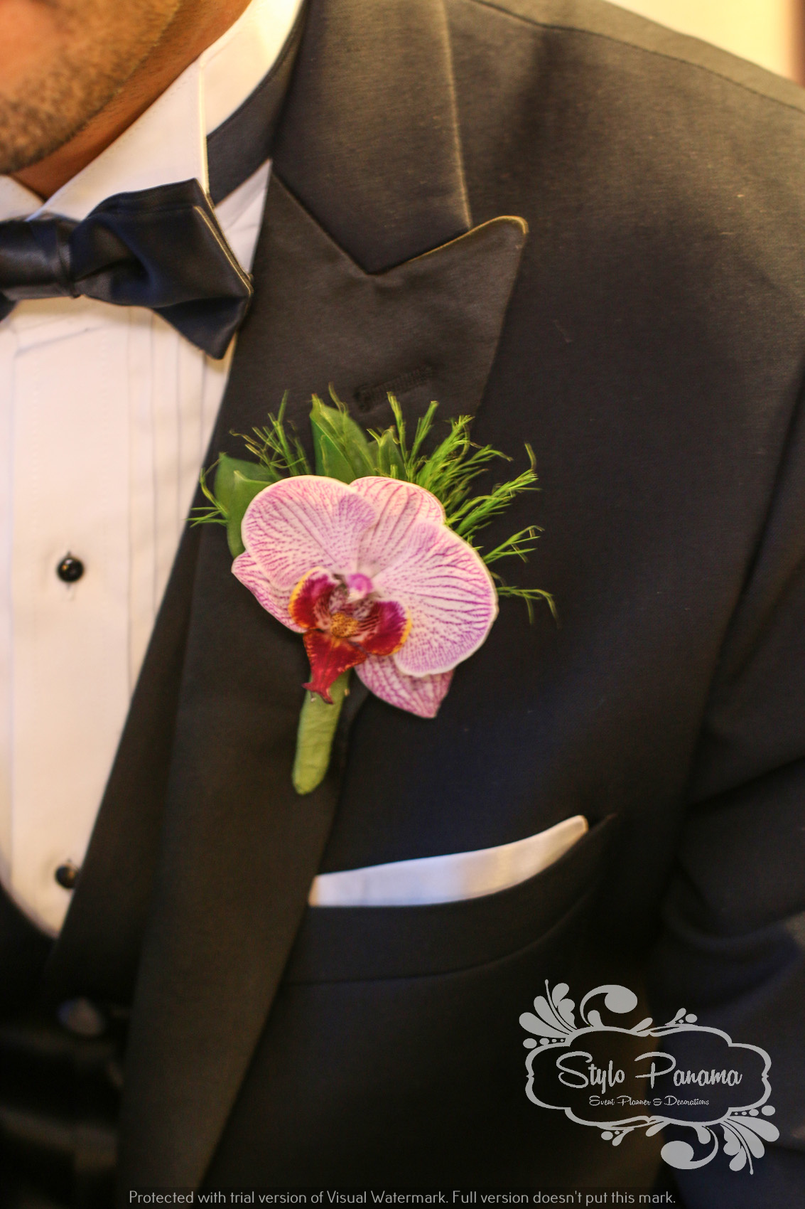 Botonier del novio en Orquídea