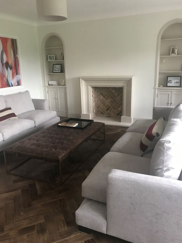 Buff brick fireplace chamber panels in Herringbone pattern