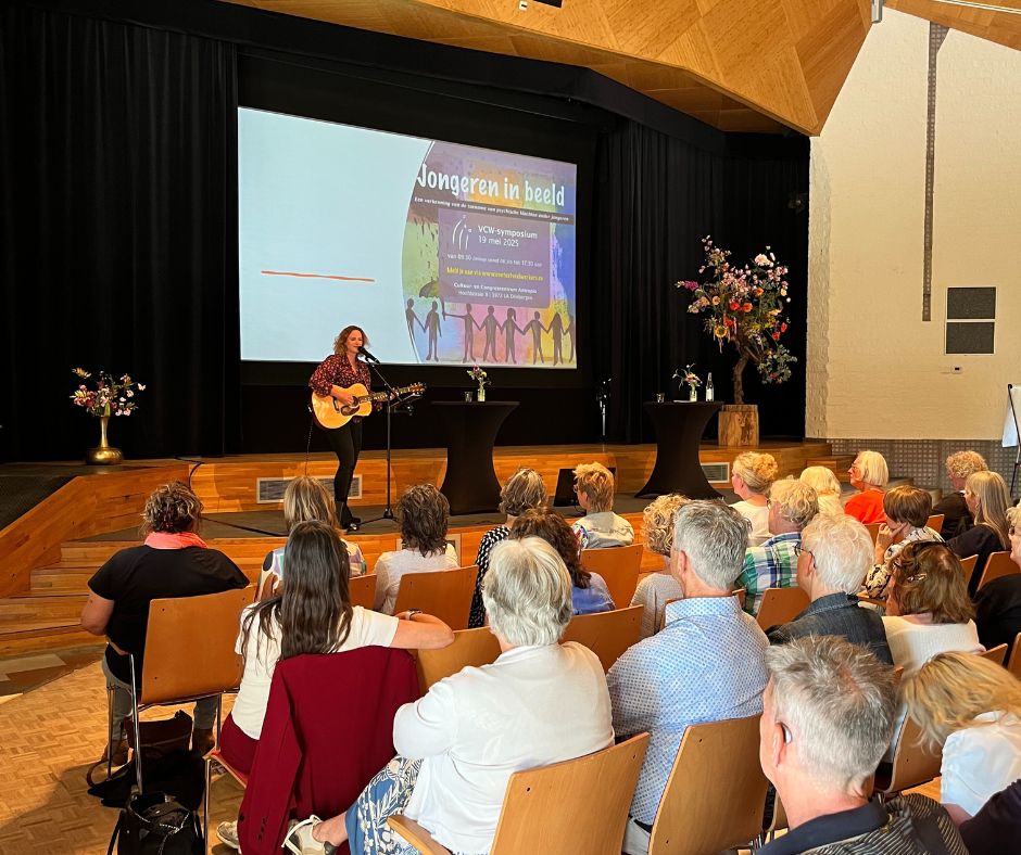 Jaarlijks symposium van Contextueel Werkers in een lied