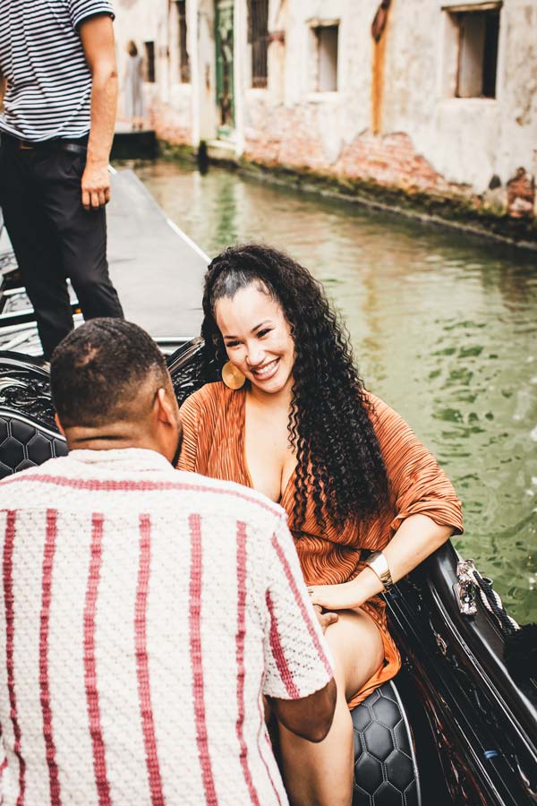 Elegant engagement photo in a gondola near the Bauer Hotel