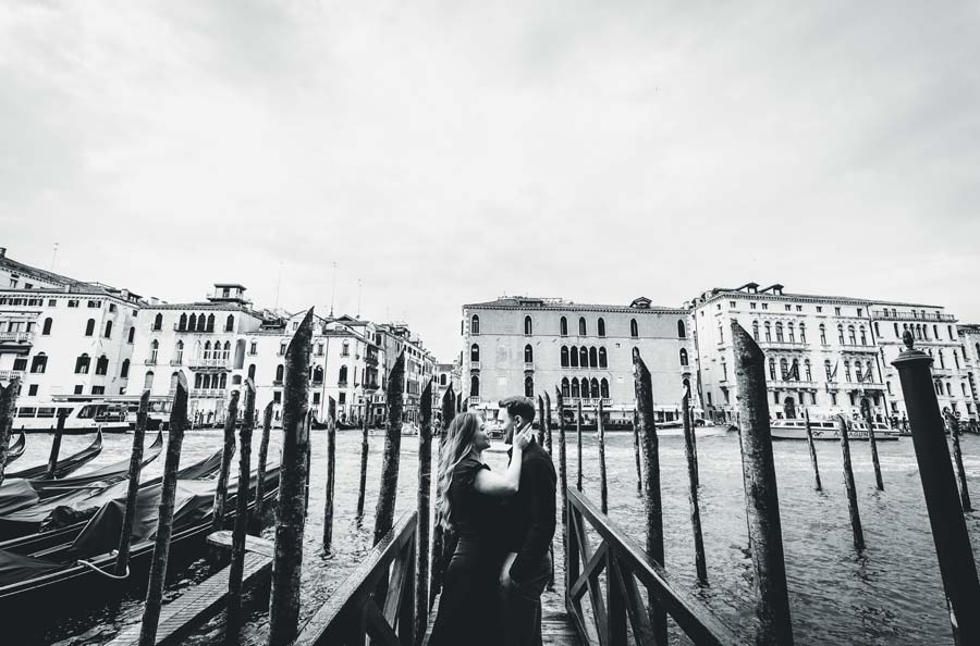 Golden hour couple photo by the Traghetto Salute in Venice