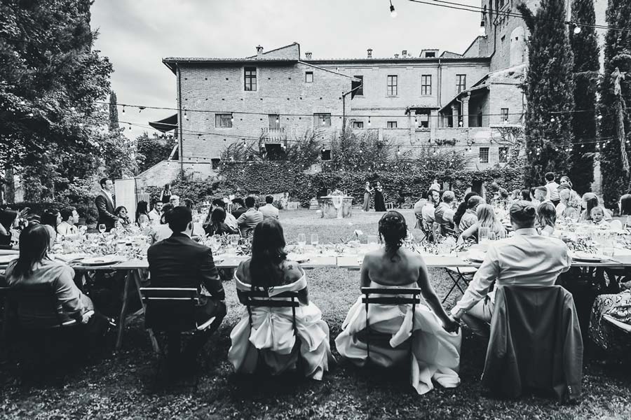 Panoramic view of Castello di San Fabiano surrounded by Tuscan hills during a wedding day