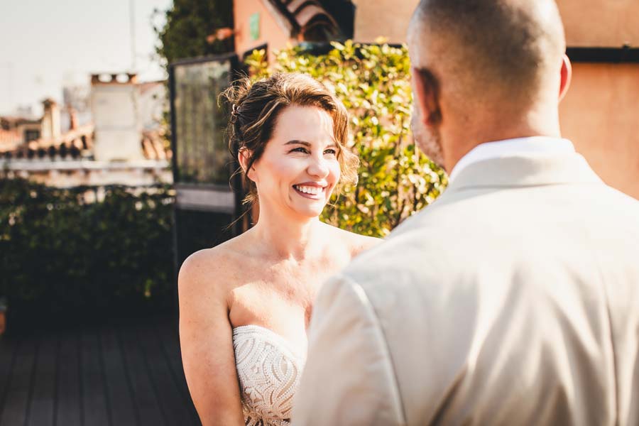Bride and groom during their elopement ceremony at Hotel Splendid Venice