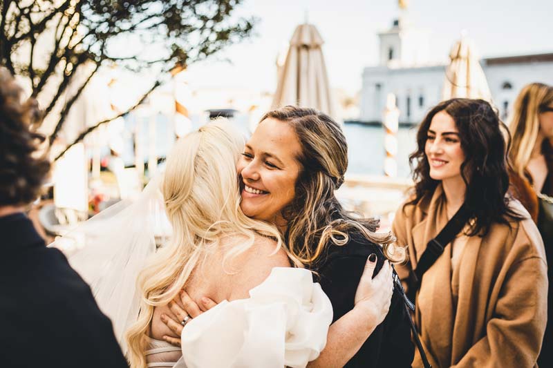 Couple sharing an intimate moment during their Venice elopement