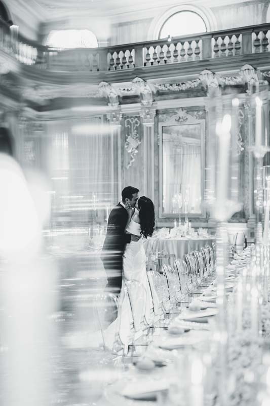 Candid shot of guests raising a toast during the dinner, Grand Canal view.