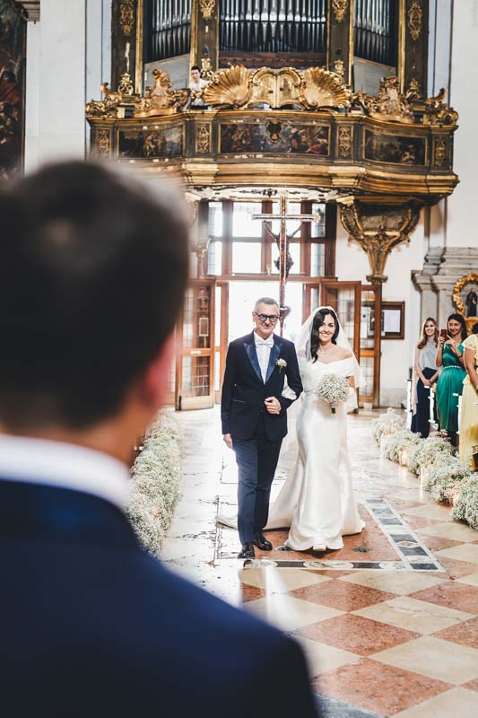 Emotional moment as the groom sees the bride for the first time (First Look).