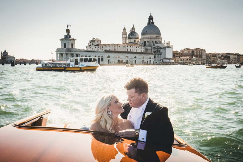 Emotional elopement ceremony framed by the Grand Canal