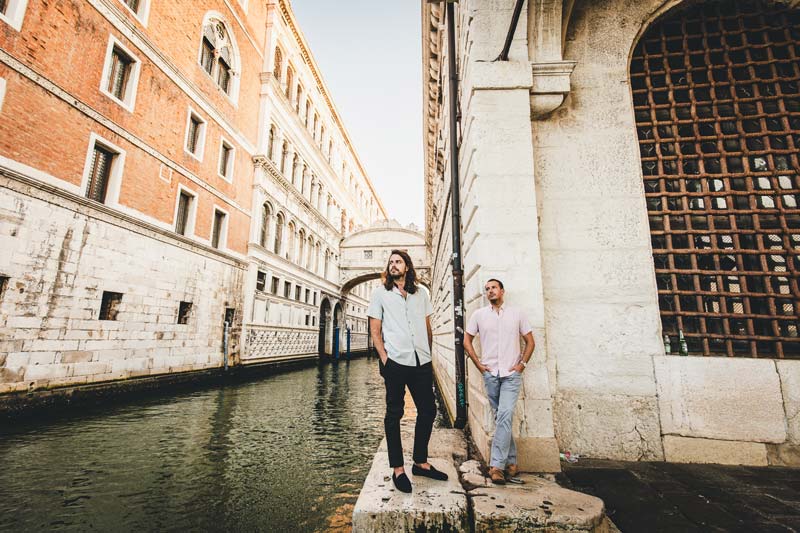 Engagement portraits of a gay couple in Venice