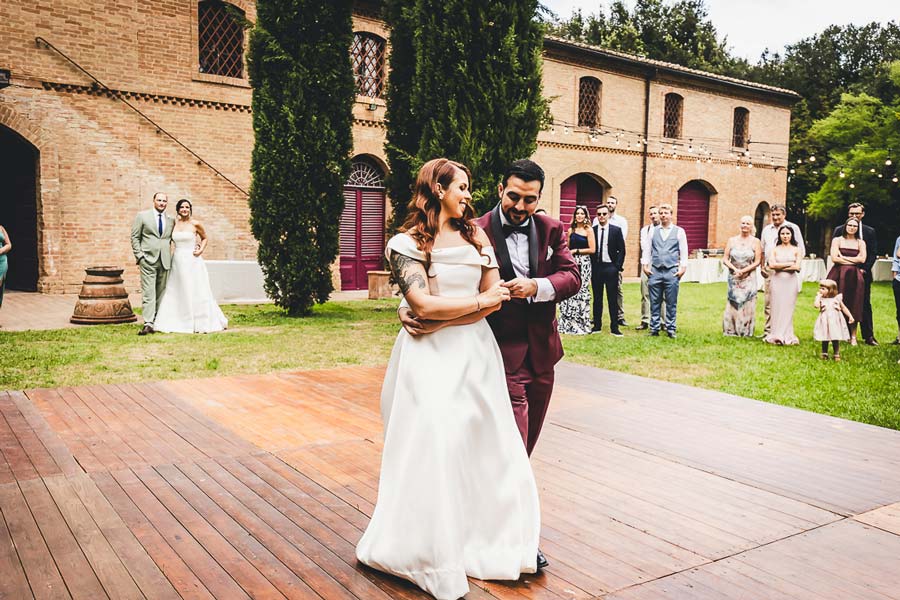 First dance of two couples in a Tuscany wedding reception at Castello di San Fabiano