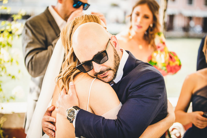 A beautiful image of the couple as they explore the city's hidden courtyards, captured by their venice elopement photographer.