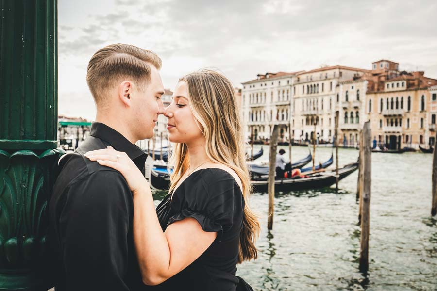 Intimate moment by the Venice Grand Canal at sunset