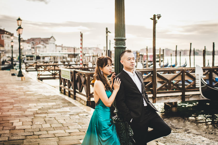 Romantic shot of the couple on a bridge in San Marco