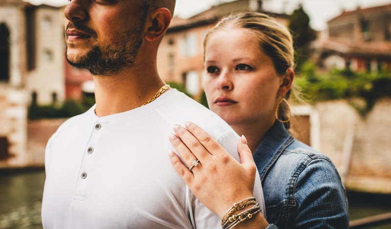 Detail shot of hands after the engagement moment in Cannaregio