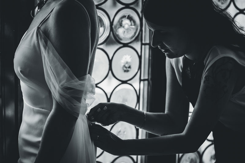A stunning portrait of the couple with the iconic Grand Canal as their backdrop, shot from the hotel’s private water entrance.