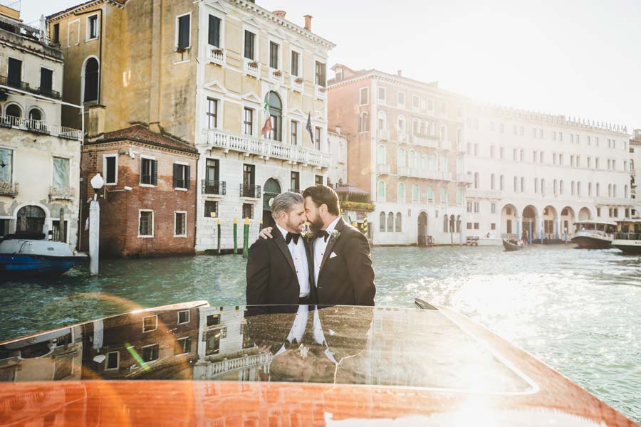 Venice elopement photographer capturing a joyful LGBTQ+ couple.