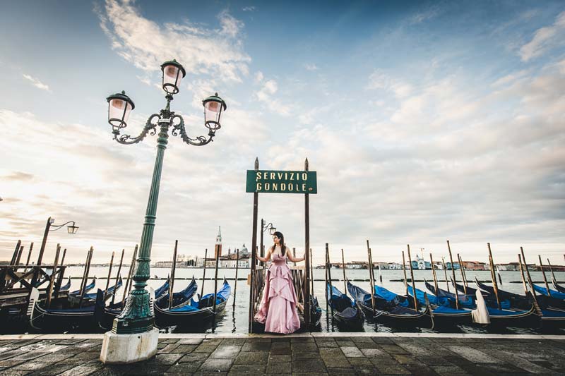Venice Quinceañera photoshoot in St. Mark’s Square with flowing pink dress