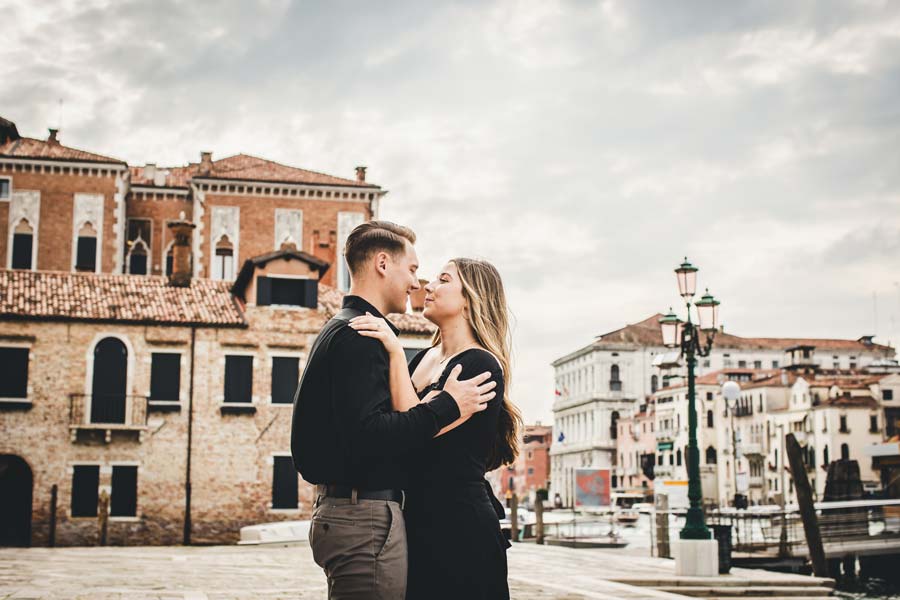 Lovers embracing near the Salute Church at sunset