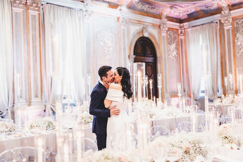 Elegant wedding reception setup in the ballroom of the Hotel Monaco, Venice.
