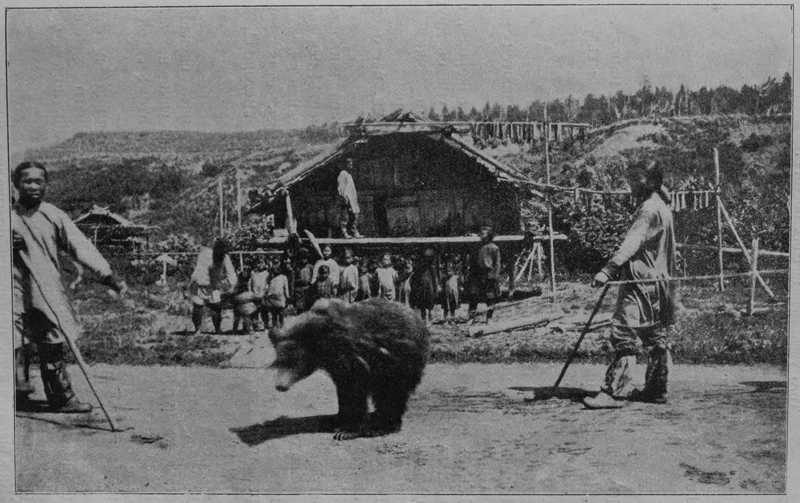 Ainu people performing the Iomante ritual