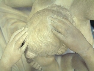 Creating the missing fingers, retouching them to match the sculpture yet still be discernable from the original. Cleaning had made the break on the wrist less noticeable.