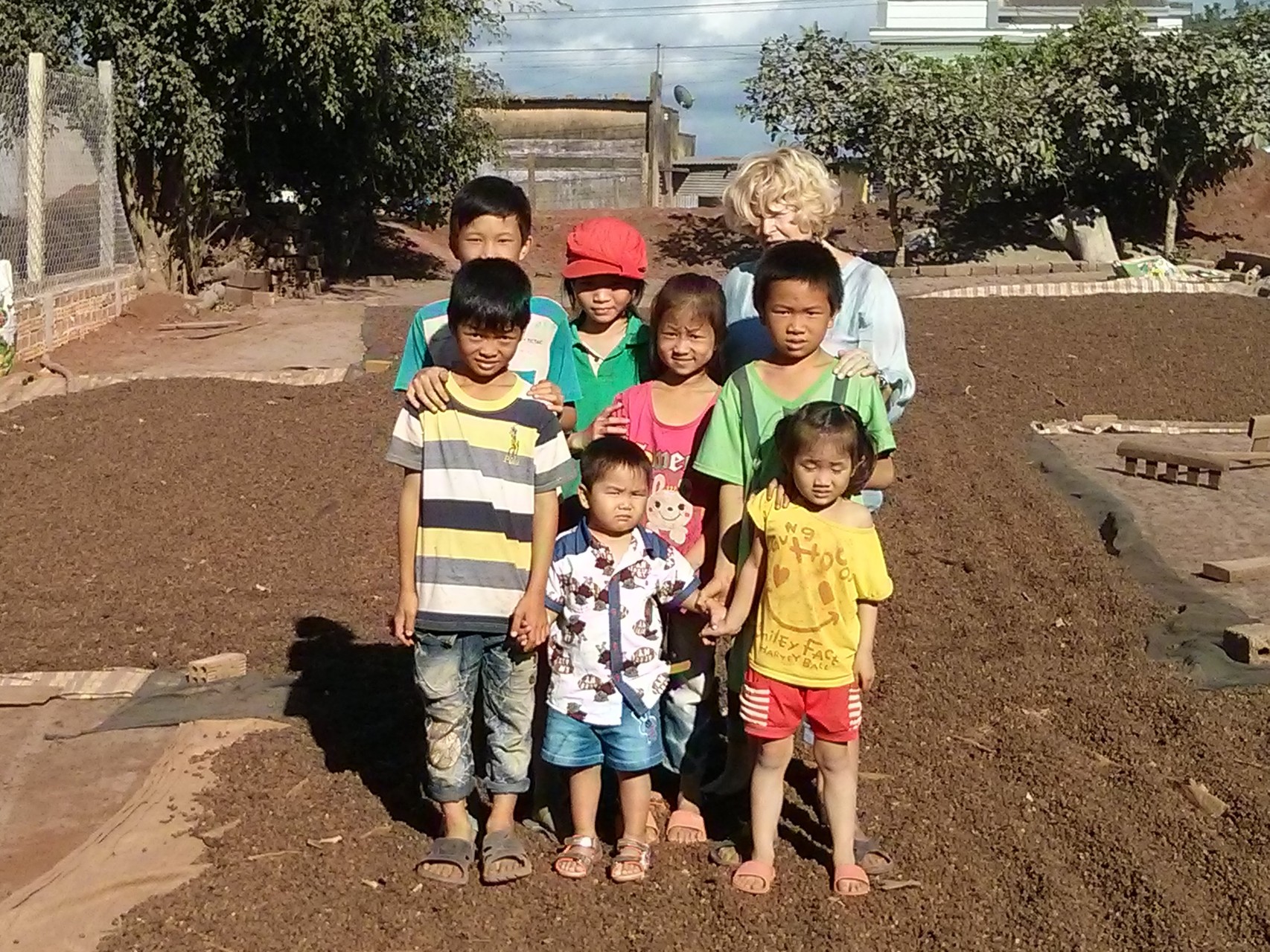children on coffee farm in daklak