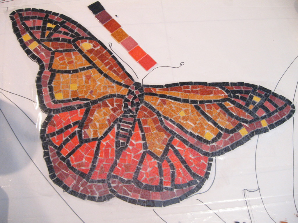 mosaïque: le premier papillon