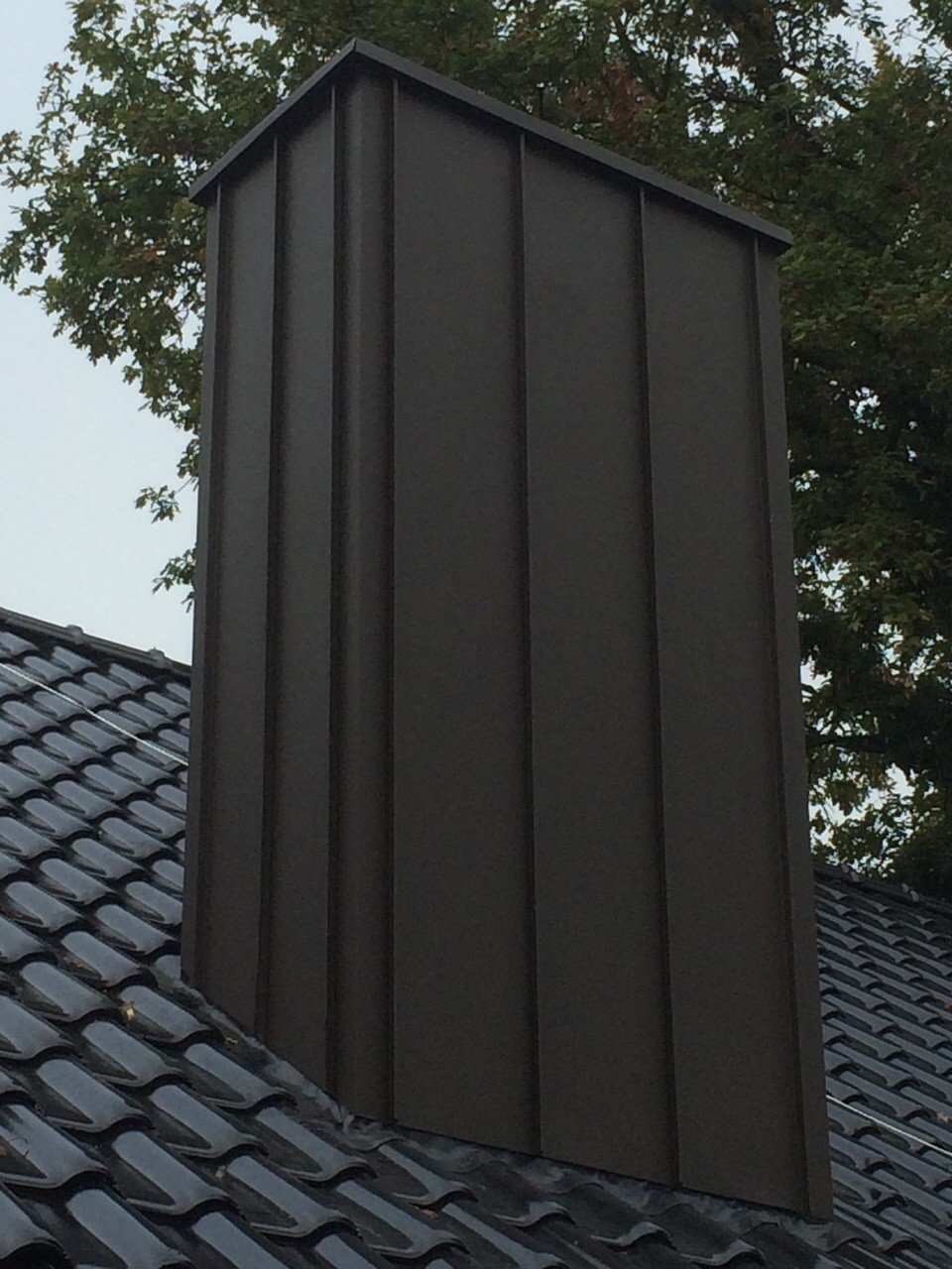 Schornsteinverkleidung aus Kupfer 
