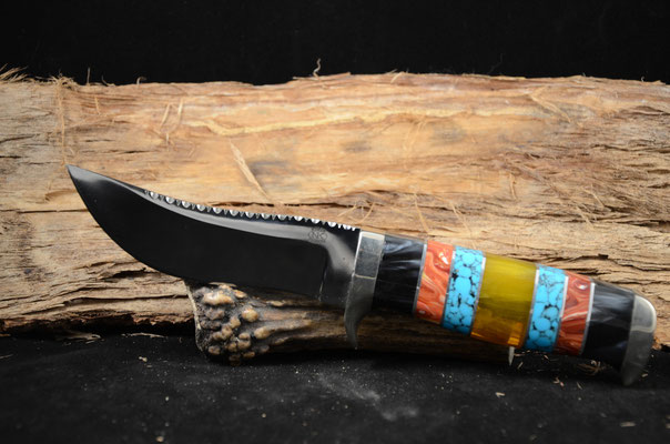 #42  Trailing Point.  Blade length 4 3/8" Overall 9 1/4" 440c steel.  Handle amber, turquoise, red coral, black pearl.  Nickel silver guard.  Maker RD Nolen  $450