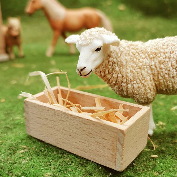 Schleich Tier vor Futtertrog
