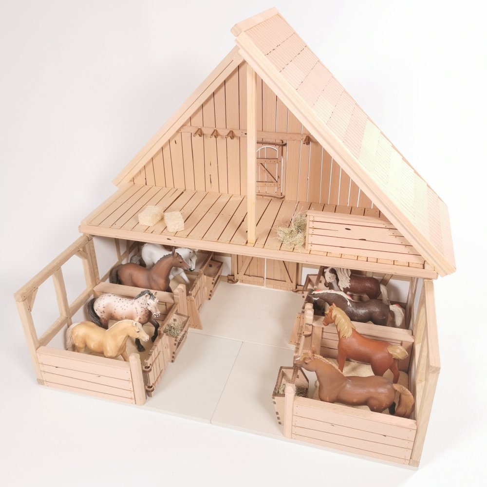 Stallanlage mit zwei Pferdeboxen als Anbauteile