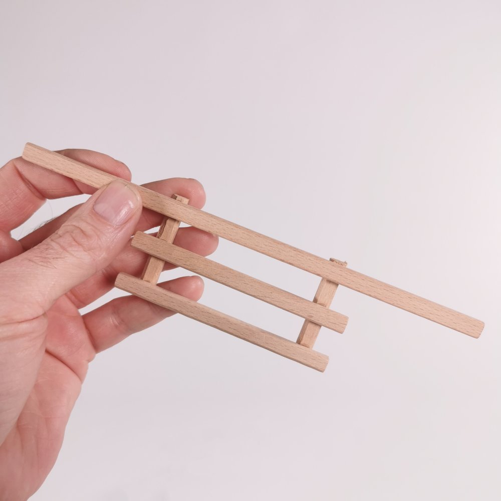 Gatter des Zaun Sets in der Hand