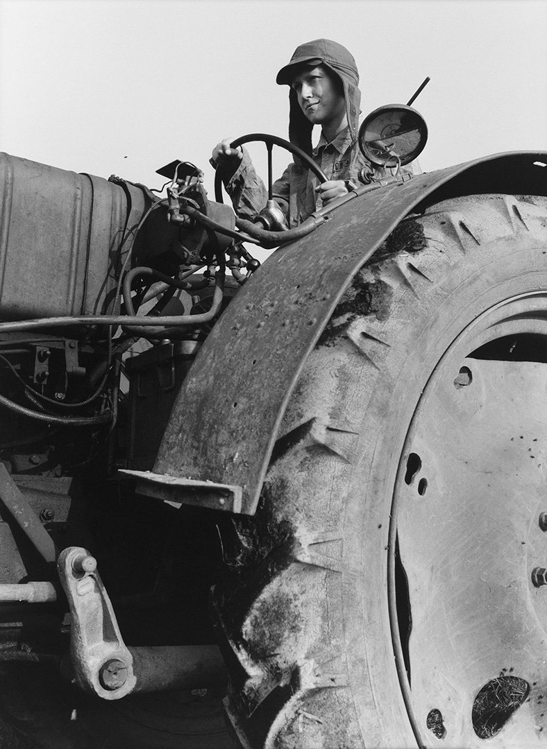 Young Woman Tractor Driver