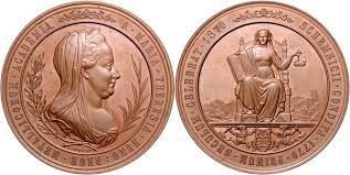 Medaille 1870 auf das 100jährige Bestehen der Bergakademie Schemnitz. Vorderseite: Maria Theresia, Rückseite: thronende Hungaria vor Industrielandschaft