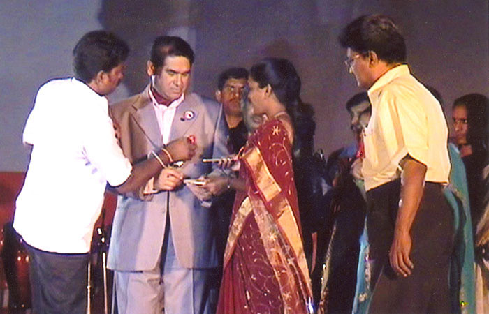  The then Director-General of Police,sigining the ID Cards of Staff /CMM at the State Level Police Advocacy Meet held in Hyderabad