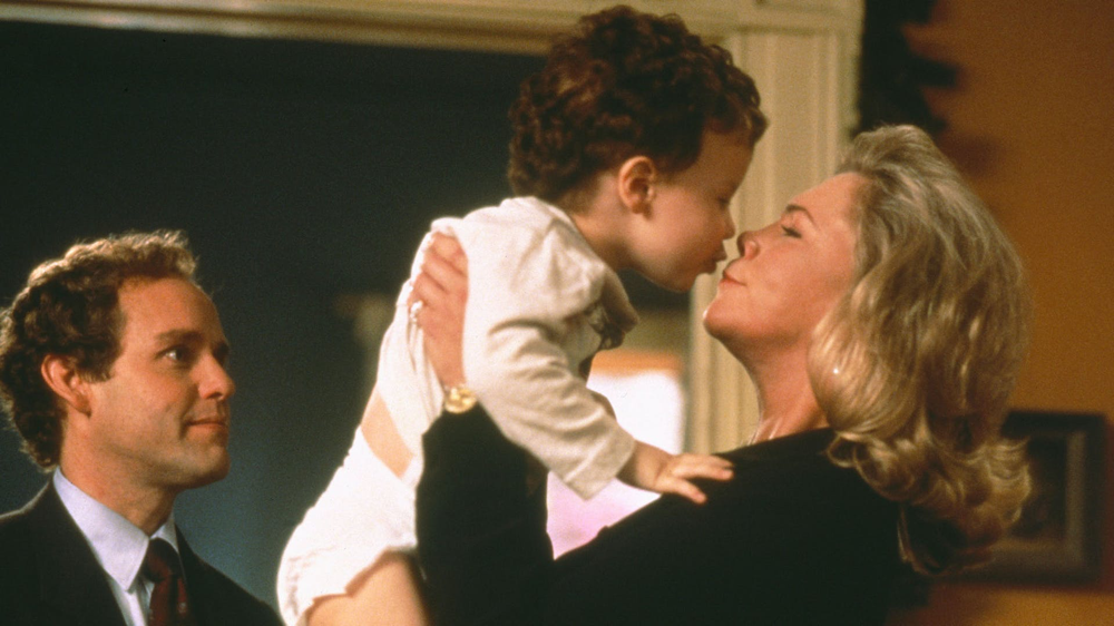 Peter MacNicol & Kathleen Turner in Baby Geniuses