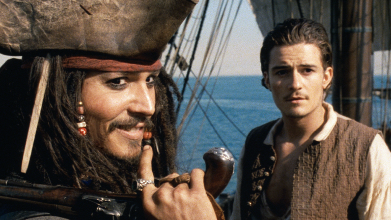 Johnny Depp & Orlando Bloom in Pirates of the Caribbean: The Curse of the Black Pearl