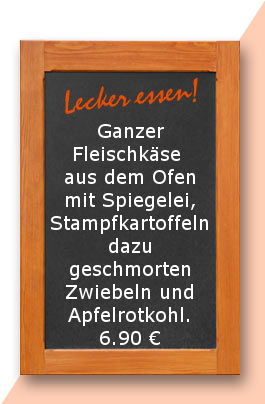 Mittagstisch am Donnerstag den 09.11.2017: Ganzer Fleischkäse aus dem Ofen mit Spiegelei, Stampfkartoffeln dazu geschmorten Zwiebeln und Apfelrotkohl.