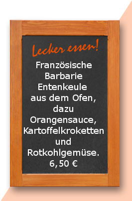 Mittagstisch: Französische Barbarie Entenkeule aus dem Ofen, dazu Orangensauce, Kartoffelkroketten und Rotkohlgemüse.
