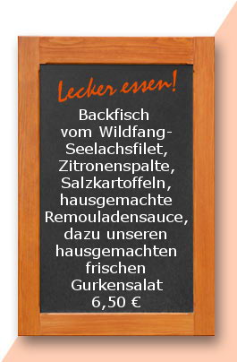 Mittagstisch: Backfisch vom Wildfang-Seelachsfilet, Zitronenspalte, Salzkartoffeln, hausgemachte Remouladensauce, dazu unseren hausgemachten frischen Gurkensalat